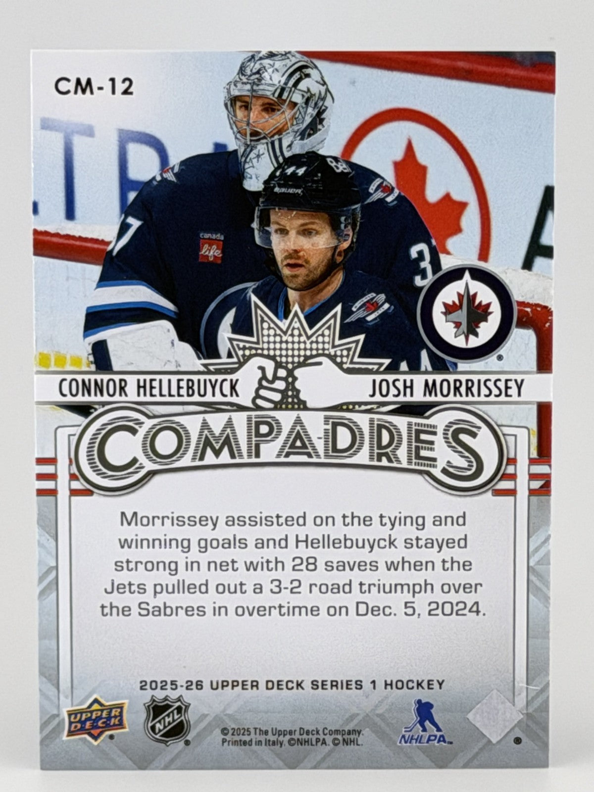 2025-26 Upper Deck Series 1 #CM-12 Compadres - Connor Hellebuyck, Josh Morrissey